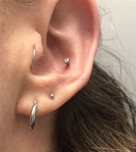 Conch pierced 6 weeks ago. Is this ready to downsize? : r/piercing