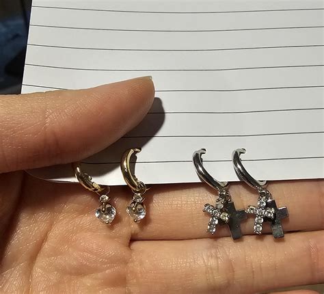 Does anyone know wgo the brand or the maker of these earrings might be ...