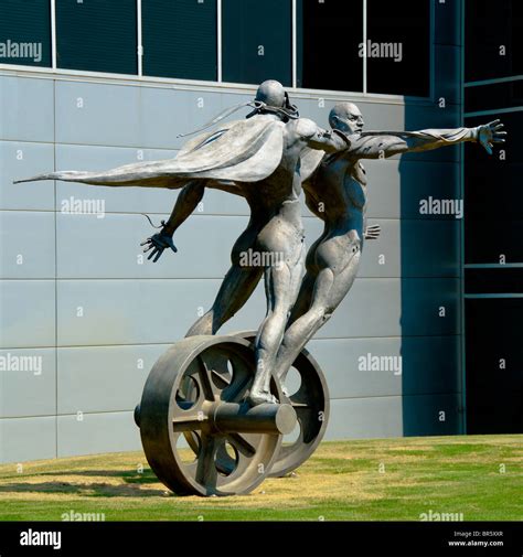 "The Chase" cast stainless steel sculpture in front of the Barber ...