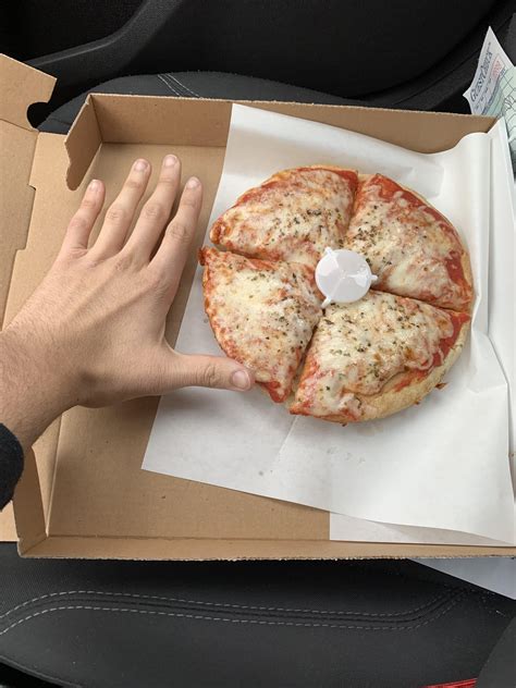 Calories in 8 inch deep dish? Hand for comparison lol : r/caloriecount