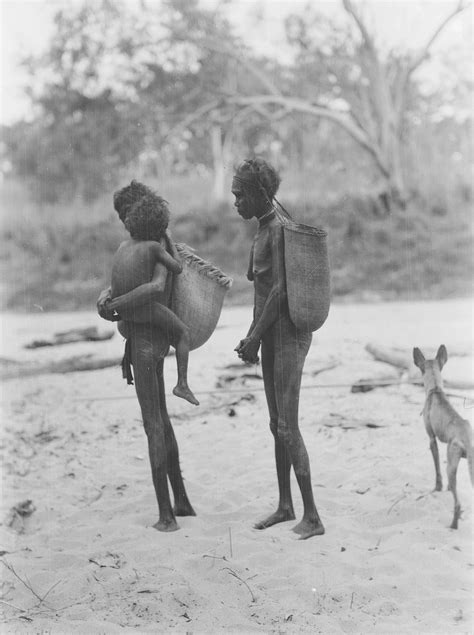 Herbert Basedow, Two women carrying large plaited baskets suspended ...