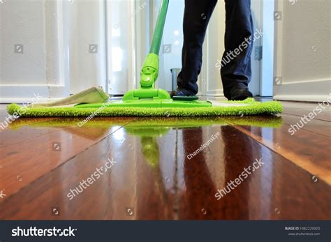 Person Mopping Wooden Floor Home Corridor Stock Photo 1982229920 ...