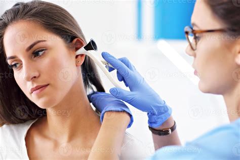 Adult woman having a visit at female laryngologist's office 15852024 Stock Photo at Vecteezy