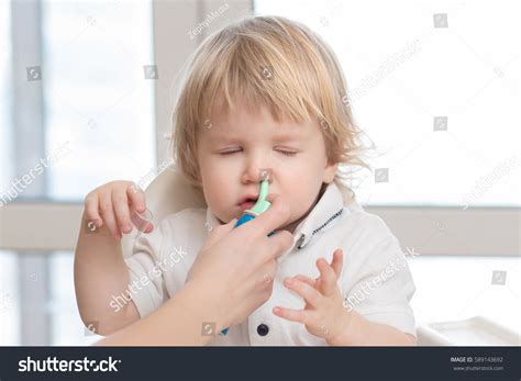 693 Baby Nose Spray Images, Stock Photos & Vectors | Shutterstock