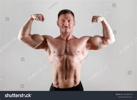 2+ Hundred Front Double Bicep Pose Royalty-Free Images, Stock Photos ...