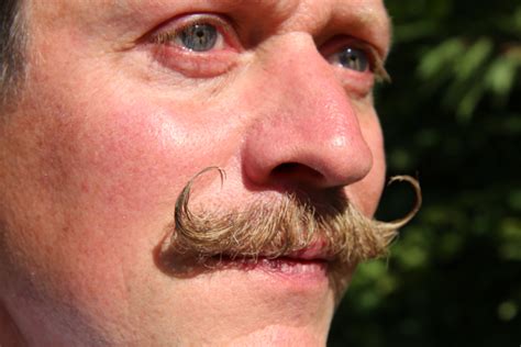 What Is a Handlebar Mustache Style? (How to Style & Wear It Well!)