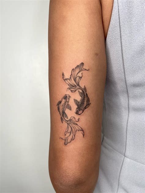 Avatar the last airbender koi fish tattoo - Bronctattooaus.com