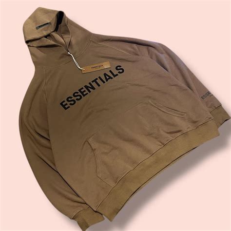 Khaki/Dark green Essentials hoodie Size Medium... | Depop