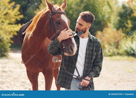 Front View. Young Man with a Horse is Outdoors Stock Image - Image of ...