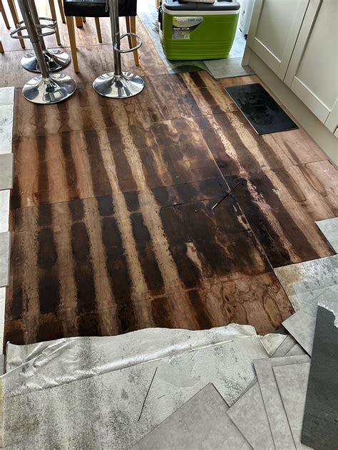 Taking up a lvt click floor, they have underfloor heating, believe it's ...