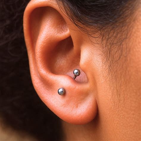 Anti-Tragus Piercing Guide: Pain, Healing, Jewelry & Aftercare ...