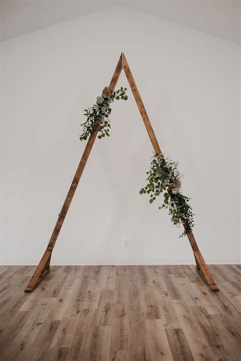 Wooden Wedding Arch with Greenery Decoration