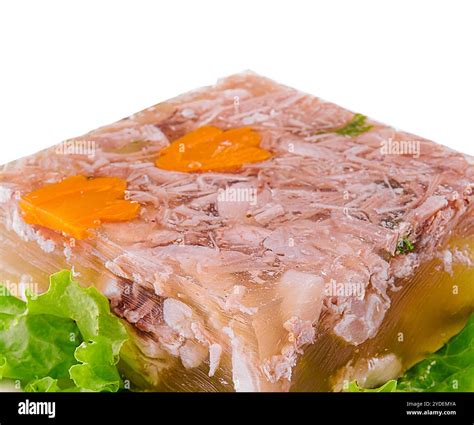 Cold appetizer, portioned jelly of pork, beef and chicken closeup Stock ...