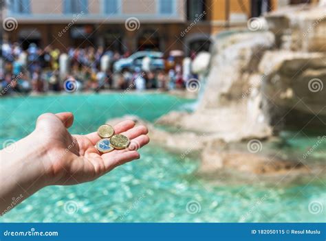 Girls Throwing Coin at Trevi Fountain for Good Luck. Stock Image ...