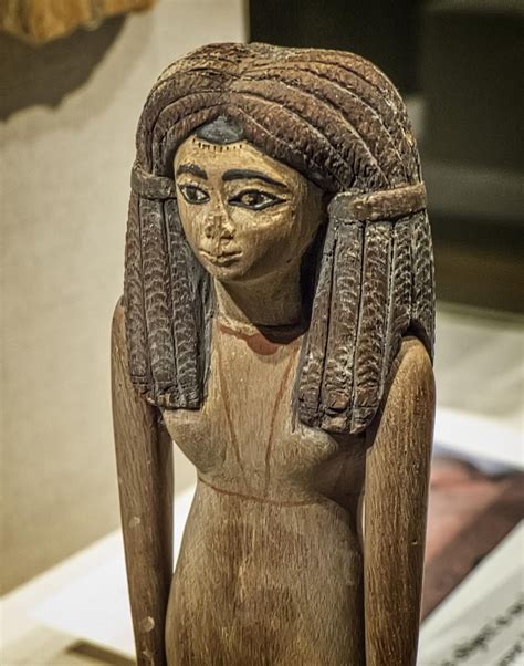 Closeup of wooden figurine of a woman Egypt Middle Kingdom 12th Dynasty ...