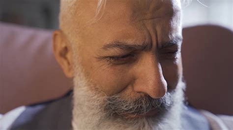 Crying Man In Close-Up. Suffering man, crying. Close-up of the eye with ...