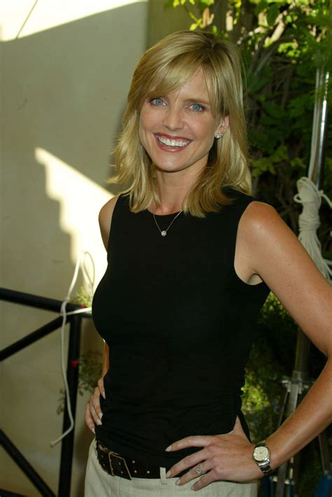 Download Radiant Courtney Thorne-Smith Smiling Wallpaper | Wallpapers.com