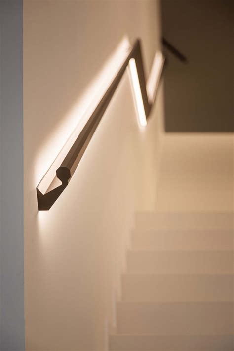 LED Lighting Above And Below The Handrail Illuminates These Stairs ...