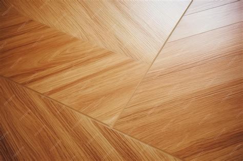 Premium Photo | Diagonally laid light brown laminate flooring