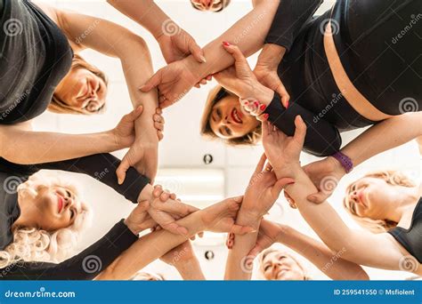 Team of People Holding Hands. Group of Happy Young Women Holding Hands ...