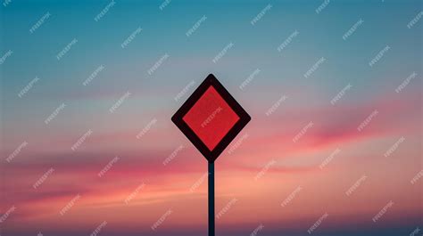 A diamond shaped sign is in the sky with a red diamond | Premium AI ...