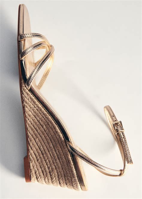 Metallic wedge sandals with straps