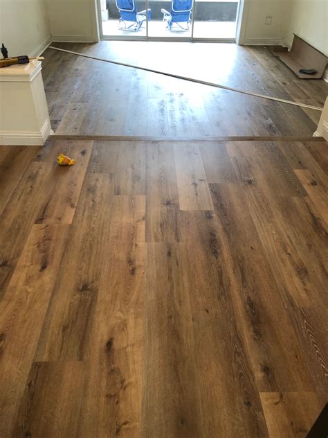 9" wide Luxury Vinyl Plank Installed - Floors and Stairway - PVB