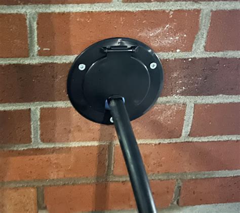 Access door in garage door for charging cable. : r/evcharging