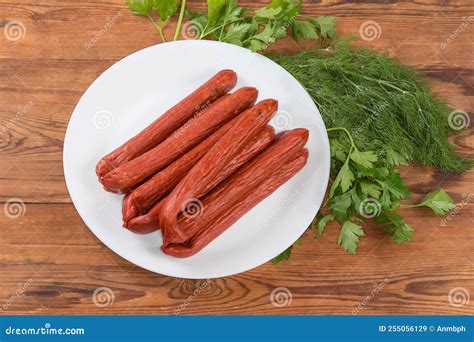Bunch of Kabanos Sausages on Dish on the Rustic Table Stock Image ...