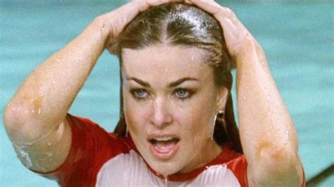 Carmen Electra, 51, shows off her incredible figure in wet see-through ...