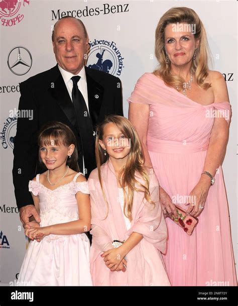 Nancy Davis (top R) with husband Ken Rickel and daughters Isabella ...