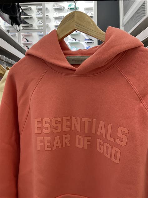 Fear Of God Essentials Ss22 Coral Hoodie | AfterMarket