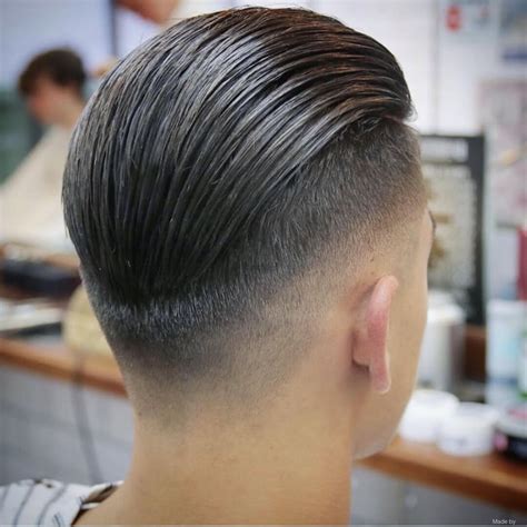 The Low Fade Slick Back: A Bold Choice for the Confident Man | Men's ...