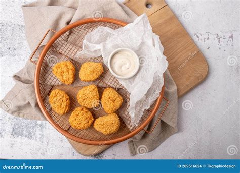 Air Fried Breaded Chicken Nuggets in a Basket with Dip and Ready To ...