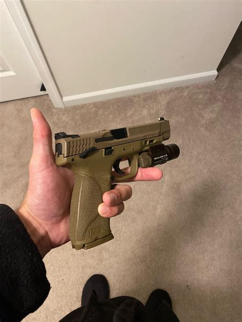 My M&P M2.0 5” (XS R3D sights and Olight Baldr Pro-R) : r/SmithAndWesson