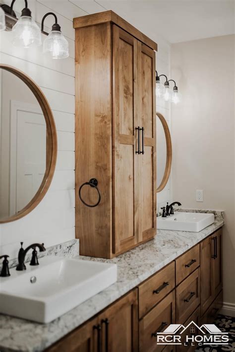 Rustic Bathroom Decor with Double Sinks and Wooden Cabinets