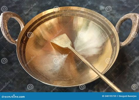 Picture of a Brass Cauldron and a Spud Stock Image - Image of cast ...