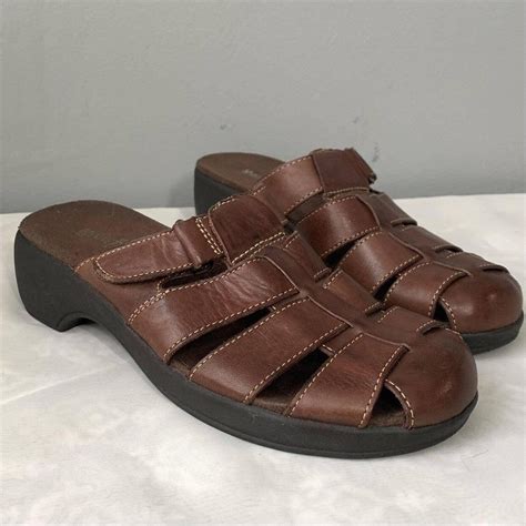Minnetonka Women's Brown Mules | Depop