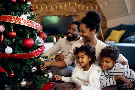 Download Black Family Christmas Tree Decoration Picture | Wallpapers.com