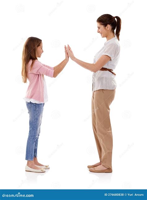 Fun and Games with Mom. Side View of a Mother and Daughter Being ...