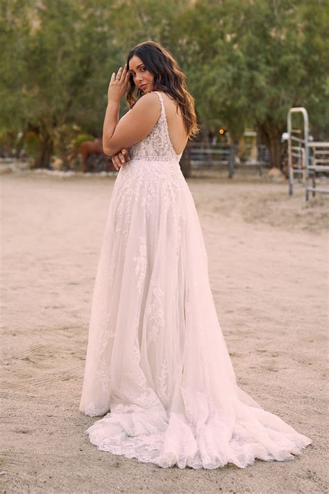 66251PS: Plunging V-Neckline Plus Size Bridal Dress with Sequined Lace Appliqués | Lillian West