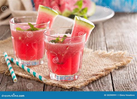 Watermelon Drink In Glass With Slices Of Watermelon On Whitebackground ...