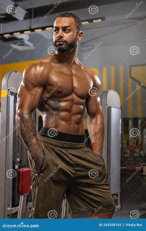 Muscular Man Working Out in Gym, Strong Swarthy Male, Naked Torso Abs ...