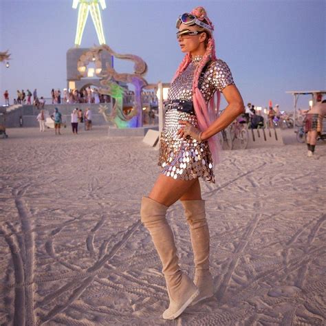 Paris Hilton Attended Burning Man 2022 With a Shiny Outfit and a ...