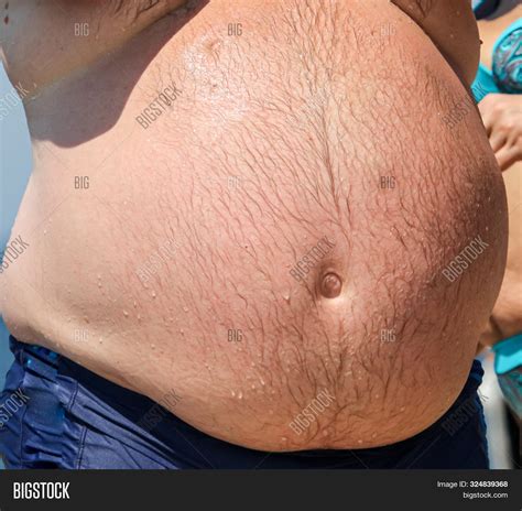 Fat Man With Belly Showing