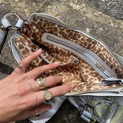 GUESS beautiful metallic silver clutch bag with... - Depop