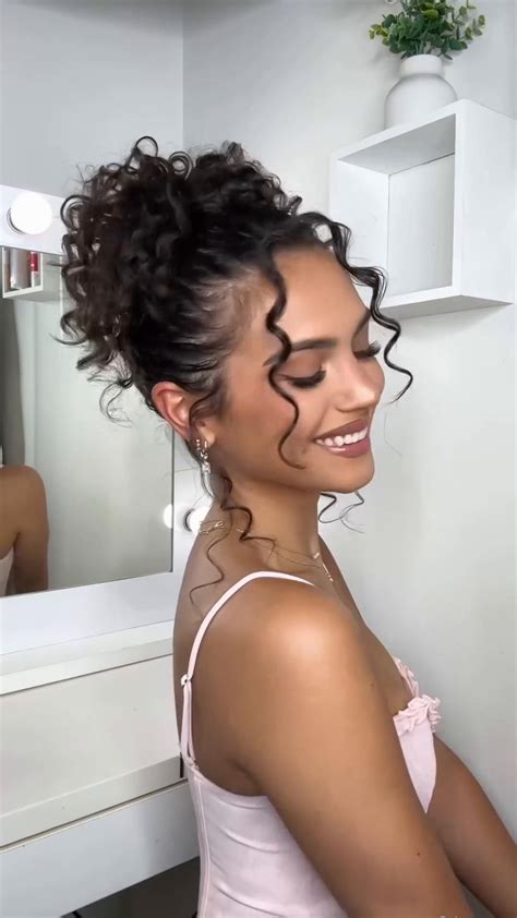 Delaney Childs messy bun hairstyle on curly hair [Video] in 2024 ...