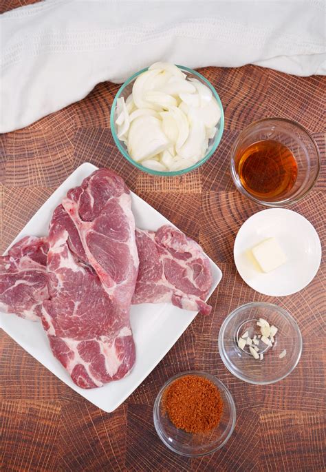 Smoked Pork Steaks with Beer Braised Onions • Smoked Meat Sunday