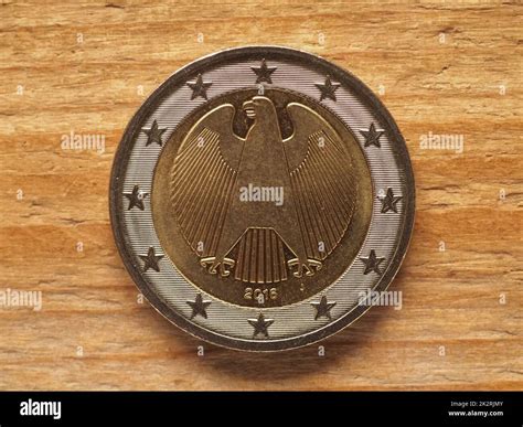 2 Euro coin showing federal eagle, currency of Germany, EU Stock Photo ...