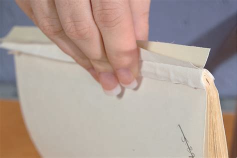 Book Repair: Reattaching Loose Contents